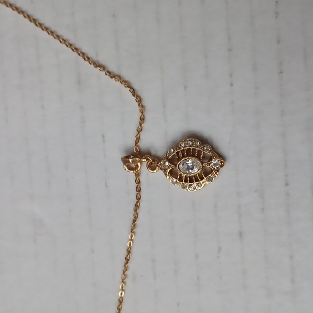 4/$40 Oval Bejeweled Charm On A Chain